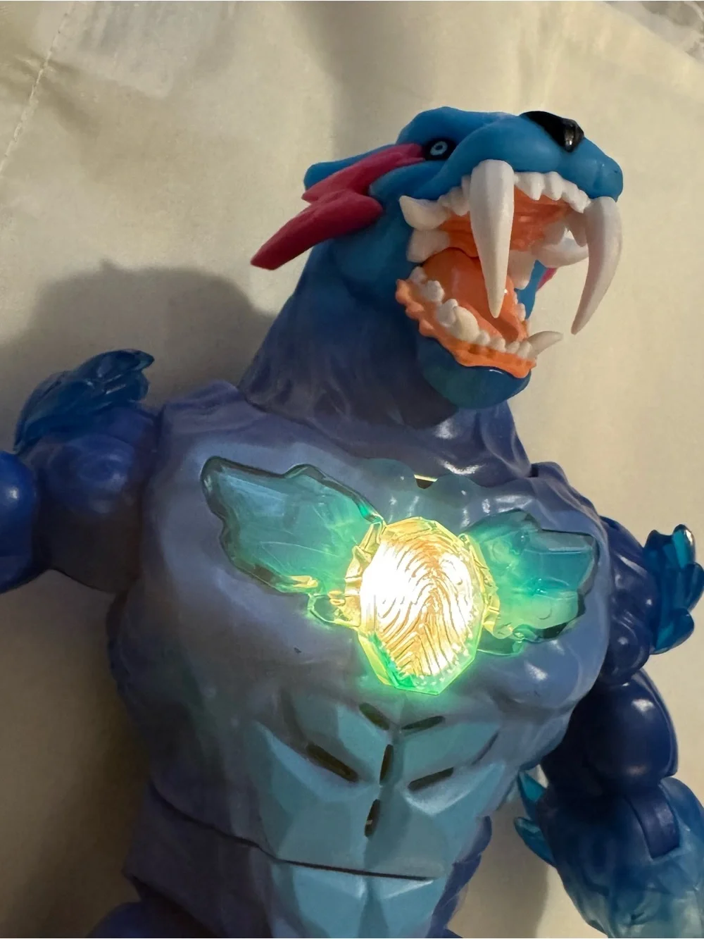 Blue Light-Up Monster Action Figure with Green Chest Glow